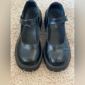 Black Mary janes, practically new. Used 5 times.